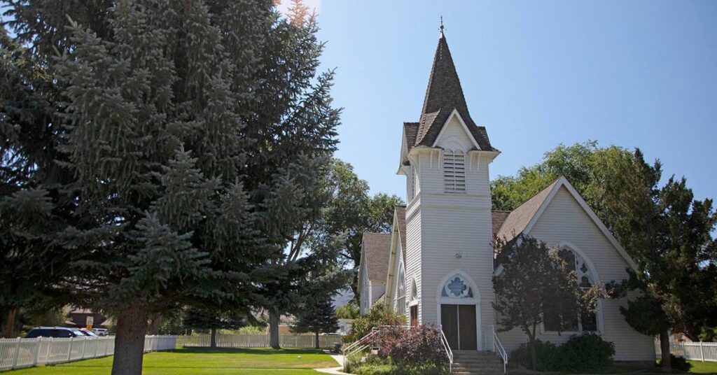Things to do in Lamoille showing a small historic church set within a quiet rural landscape